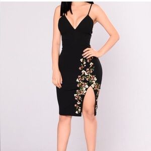 Size Medium Fashion Nova dress. Beautiful floral detail in the bottom